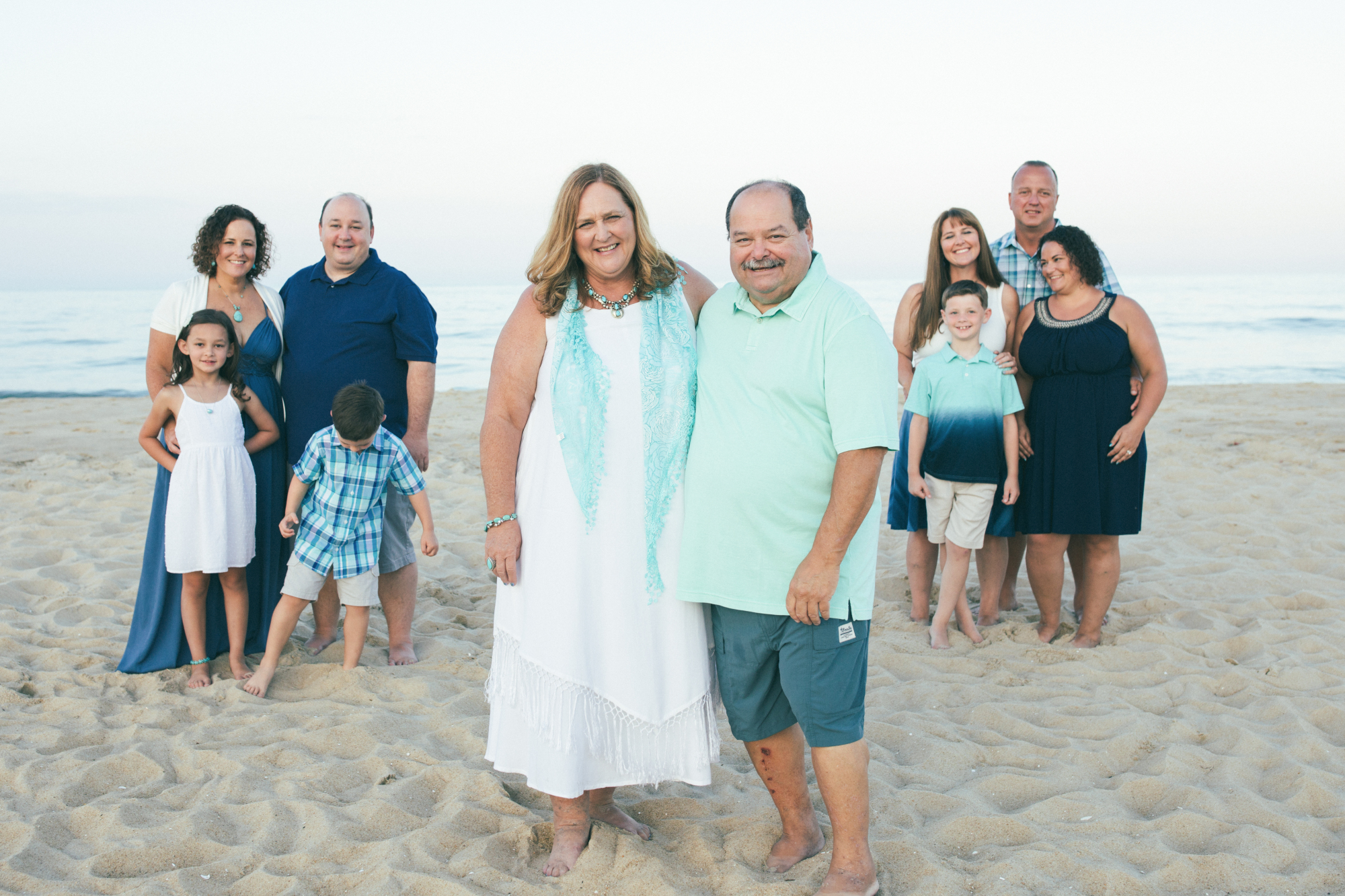 Candid family photo on Bethany Beach shoreline