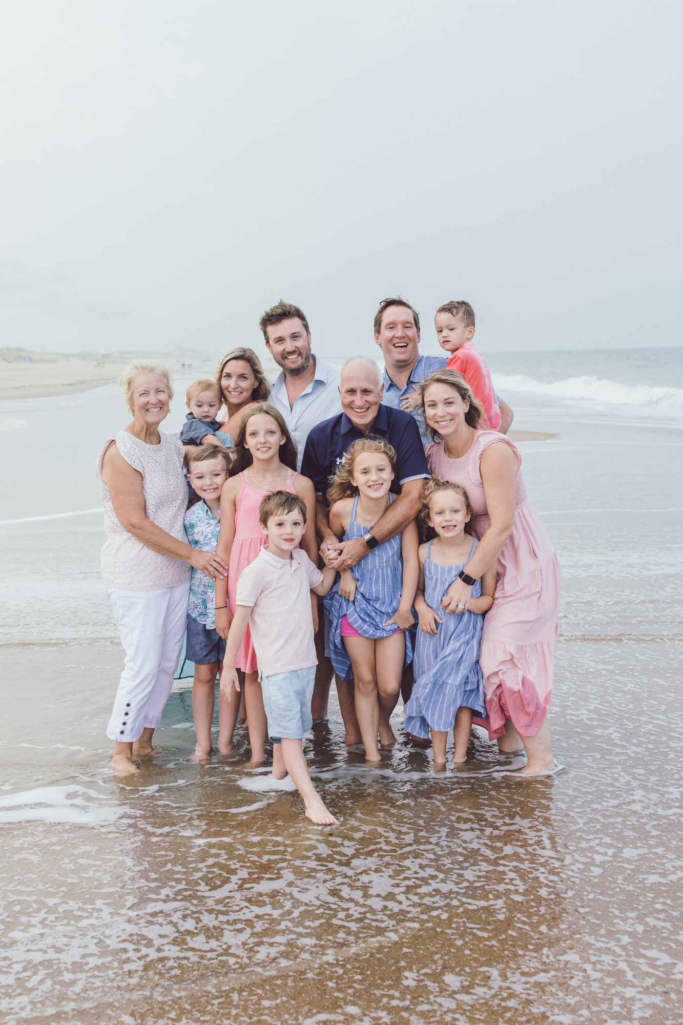 Family laughing together on Bethany Beach