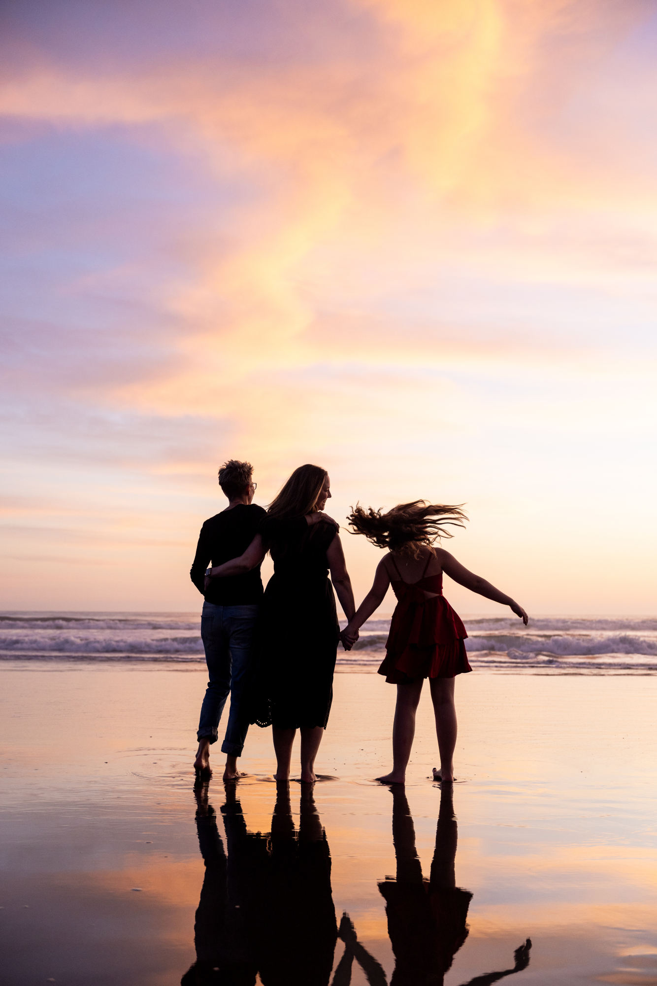 Sunset silhouette family portrait on Bethany Beach